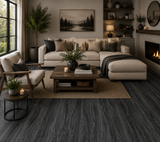 ASX-7134 Burnt Grey 5MM Desertland SPC Flooring installed in a contemporary living space featuring elegant dark grey wood flooring