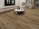 SA552 Ebony Oak glue down luxury vinyl plank flooring featured in a contemporary interior with warm brown wood-look flooring