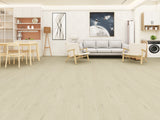 Modern interior showcasing SA588 White Sand Glue Down LVT flooring with soft white sand tones and natural wood grain detail