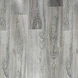 2032 Eternity Grey 5MM Desertland SPC flooring with cool grey oak planks, refined wood grain texture, and contemporary light grey wood appearance