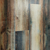 306-8 Makers Oak 5MM Desertland SPC flooring with multi-tone brown and grey oak planks, rustic wood grain texture, and weathered reclaimed wood appearance
