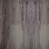 8076-5 Crown Oak 5MM Desertland SPC flooring with rich brown oak planks, pronounced wood grain texture, and authentic rustic oak character
